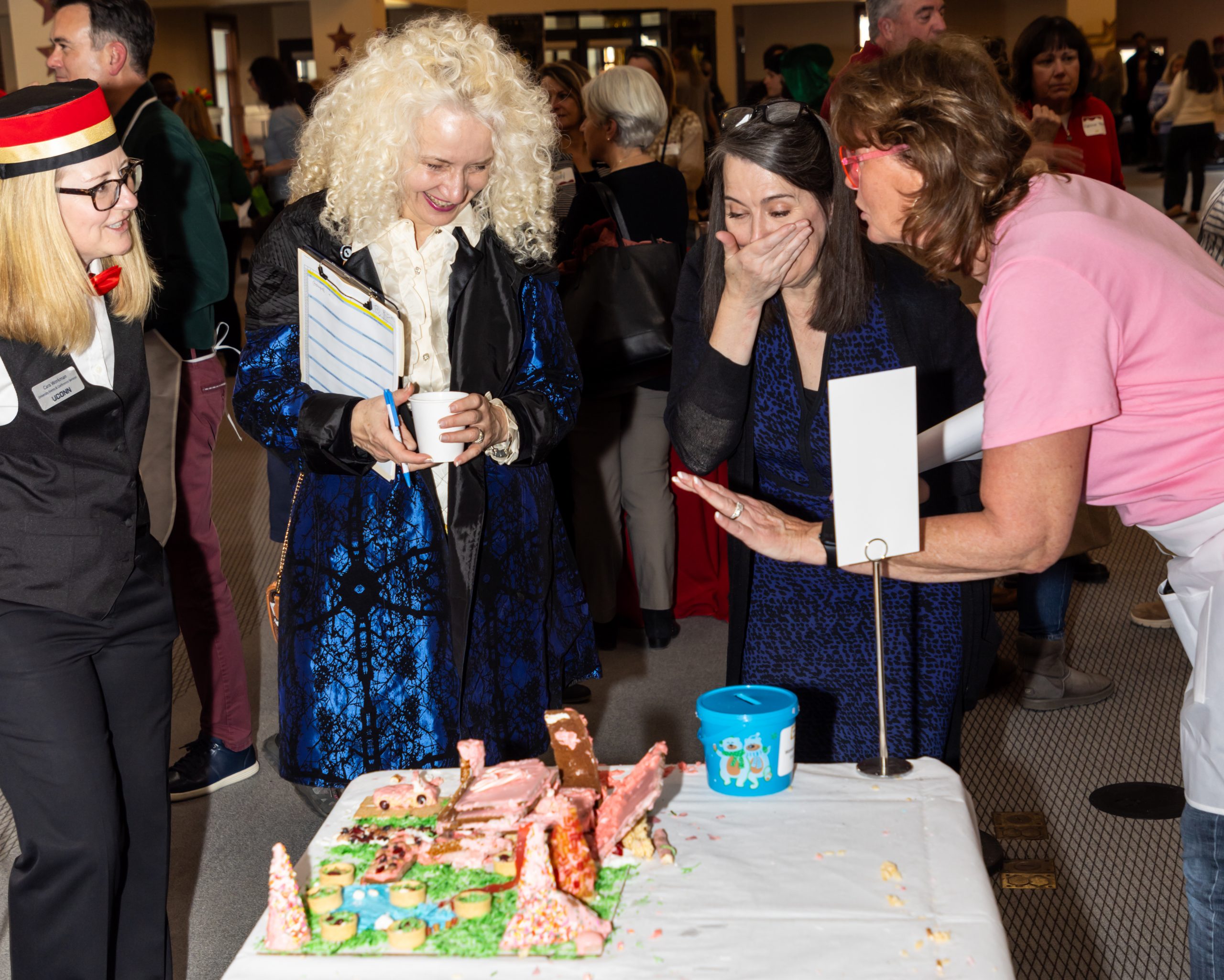 President Maric and Provost D'Alleva judging the 2023 Gingerbread House Decorating Competition